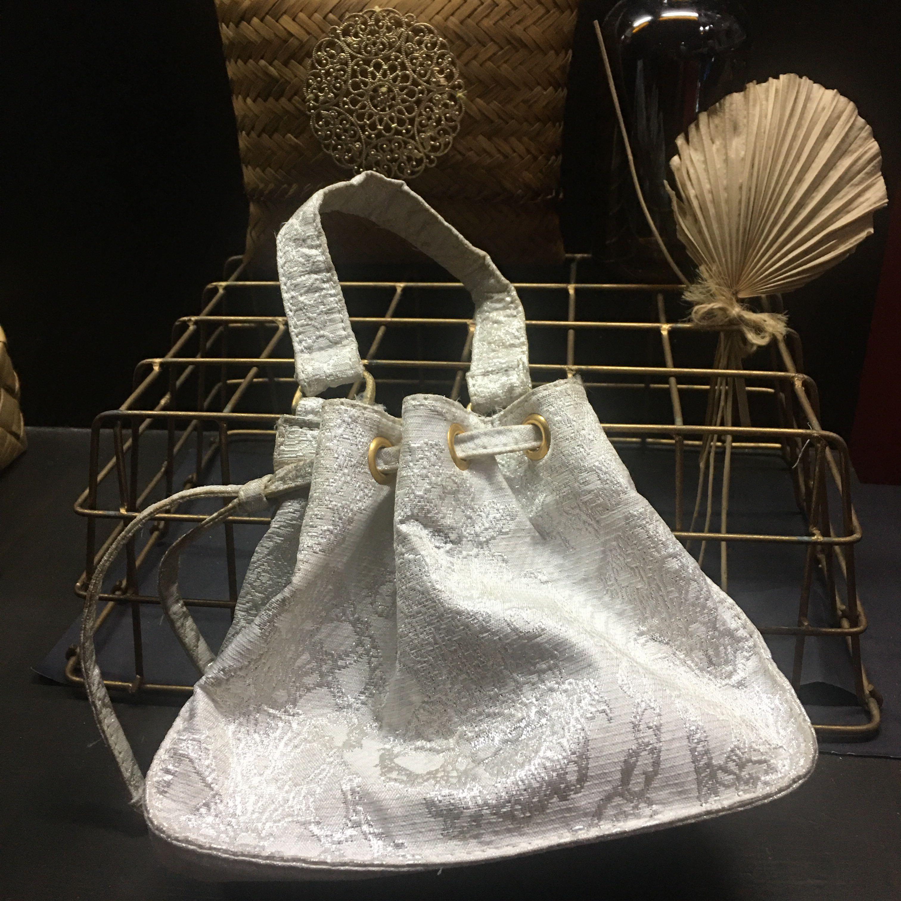 Christian Lacroix Paris Small Bag (Category: Luxury Bags & Wallets) located in Manila. Submitted by coolandchic (Listing ID 1165570459, Image 2). Description: From Paris Drawstring Small size Has slight mark from storage .