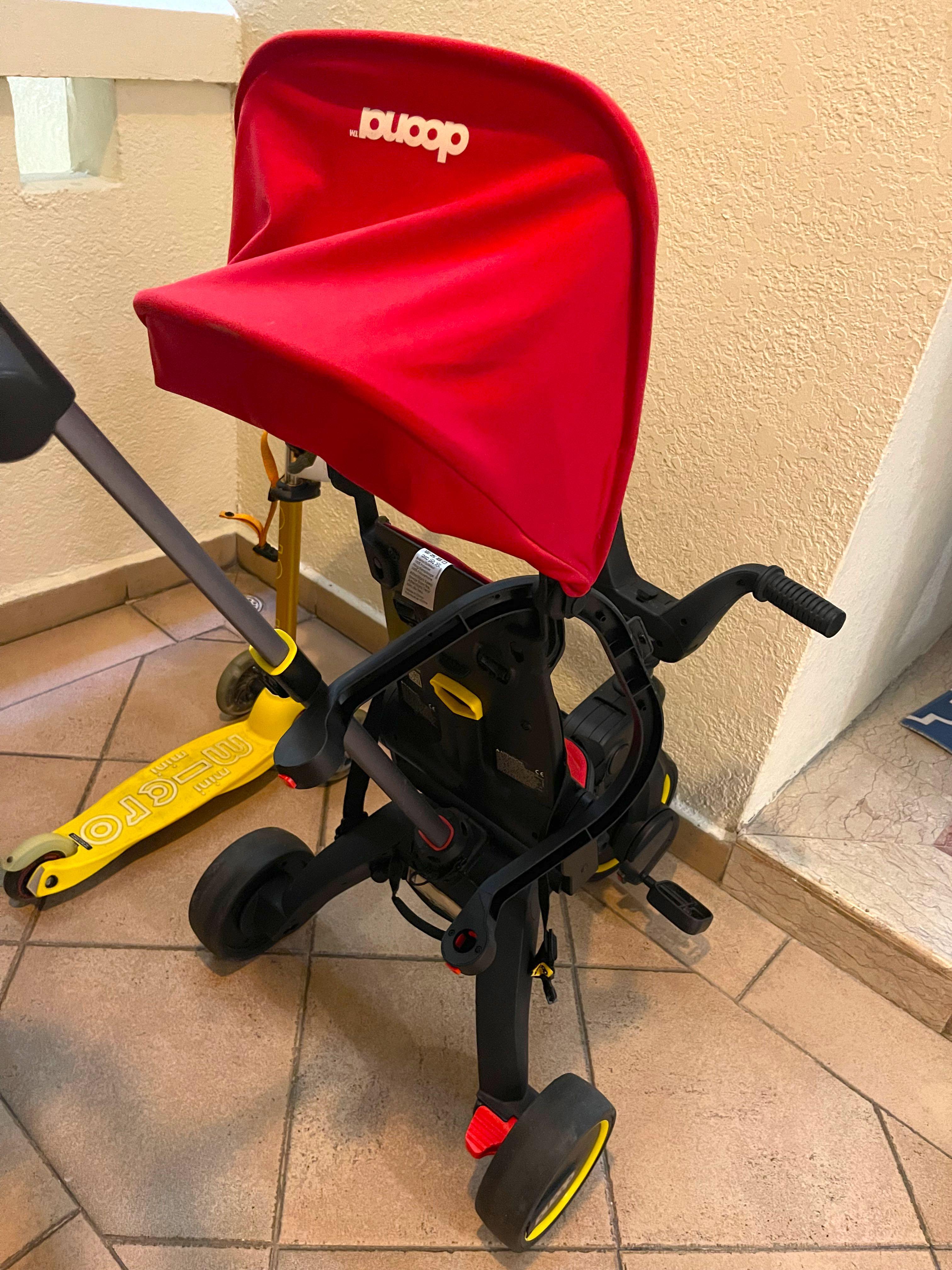 Doona trike Red foldable, Babies & Kids, Going Out, Strollers on Carousell