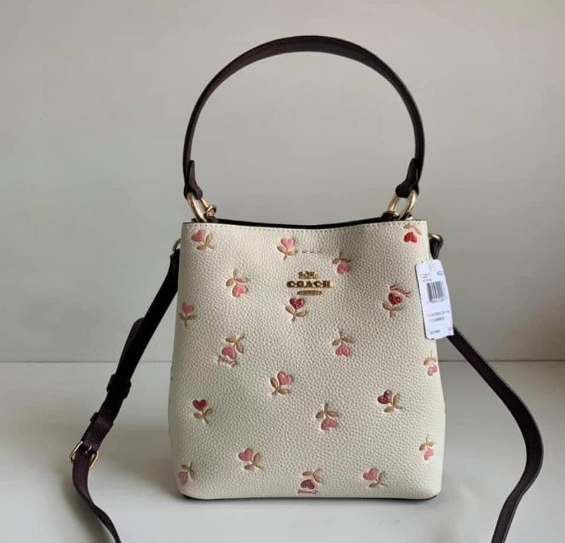 Coach small town bucket best sale bag with heart floral print
