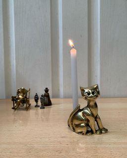 Vintage brass cheshire cat candlestick holder from the 1950s