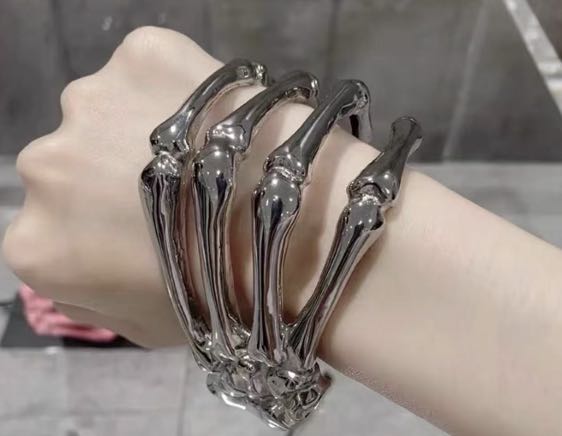 Alexander McQueen Dancing Skeleton cuff bracelet  Harvey Nichols