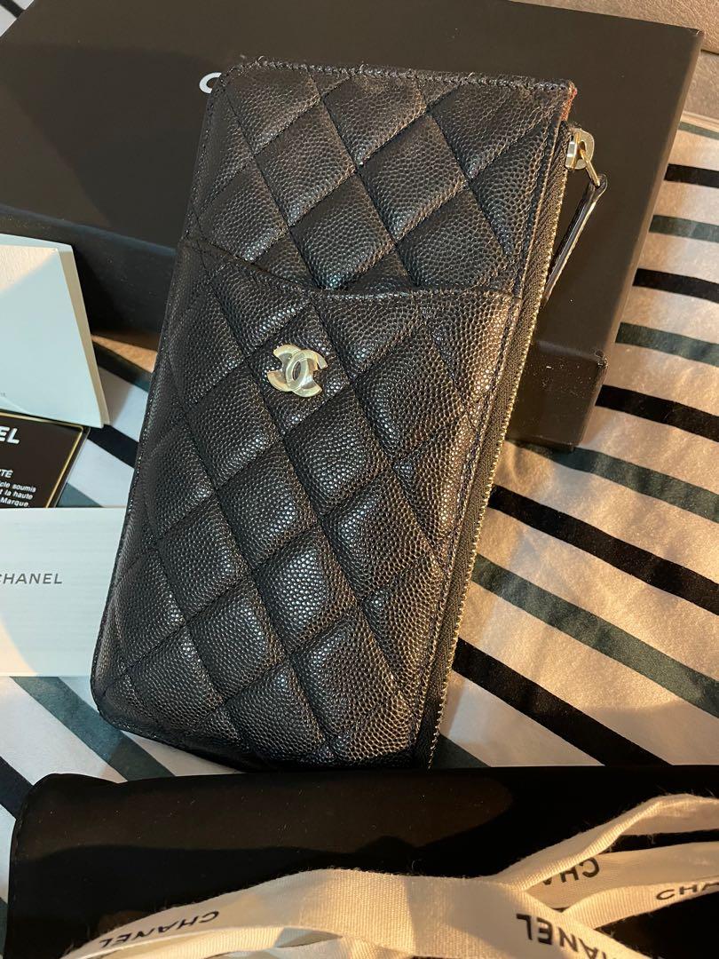 Chanel wallet / phone case gold hardware (Category: Luxury Bags & Wallets) located in Quezon City. Submitted by trishaleah (Listing ID 1169831464, Image 2). Description: For Sale good as new Chanel wallet in gold hardware With box & dust bag Location mandaluyong & quezon city.