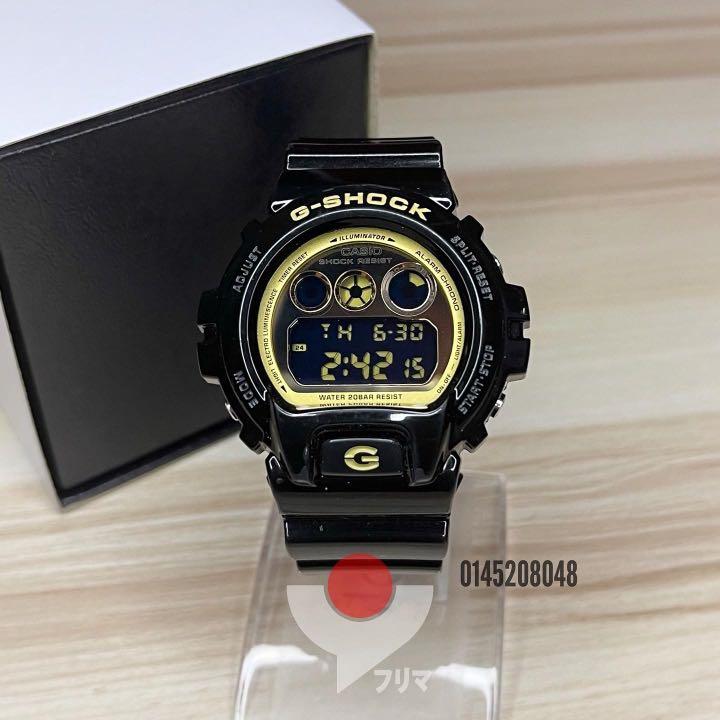 G Shock DW 6900CB 1 3230 Black Gold Men s Fashion Watches