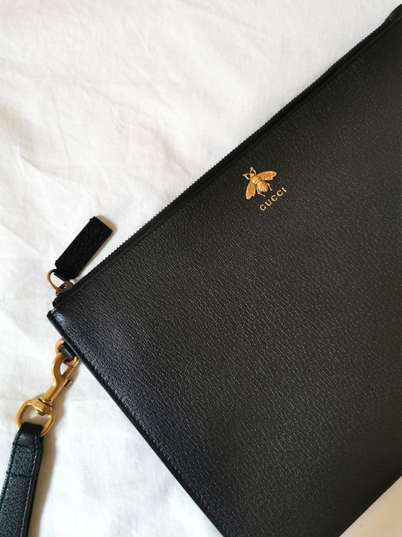 Gucci bee star leather pouch store