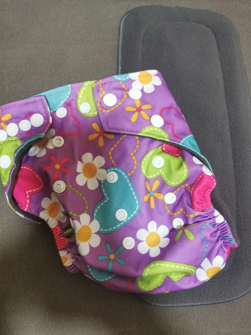 Washable / Reusable Cloth Baby Diaper (Category: Diapers & Baby Wipes) located in Manila. Submitted by kitsymacam (Listing ID 1169835839, Image 3). Description: Quids brand. Never been used. With 5 bamboo inserts included..