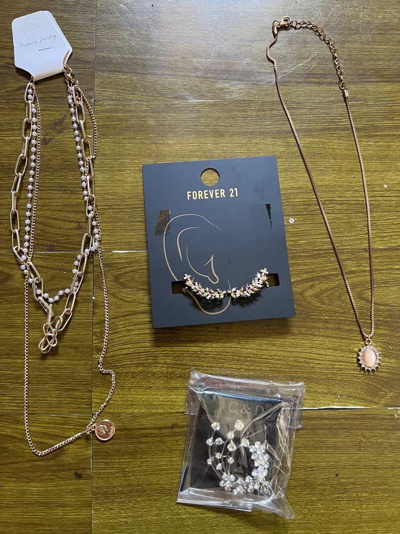 Accessories (Category: Other Accessories) located in Pasig City. Submitted by ecdnp (Listing ID 1171657237, Image 2). Description: 2 necklaces (got them from shoppee ₱70 each) 1 forever 21 earrings (₱400 original price got it from US) ‼️ FIXED SET PRICE ‼️ ❌ brooch not included ❌.