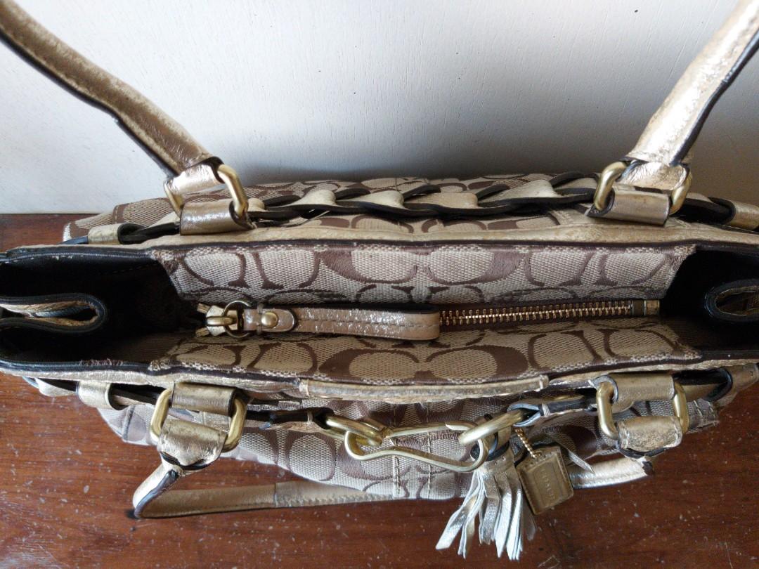Coach Hampton Signature Logo Canvass Handbag (Category: Luxury Bags & Wallets) located in Iba. Submitted by skygregorio (Listing ID 1171663655, Image 3). Description: 100% Original 😊 All clean inside po.. Nastock lang po kaya may flaws.. Please see pictures po for reference. All good po ang Canvass material pero may oxidation/ fading part po sa mga metallic parts. Hopefully, magawan po ng paraan if nirepaint. Still negotiable. PM for more detail