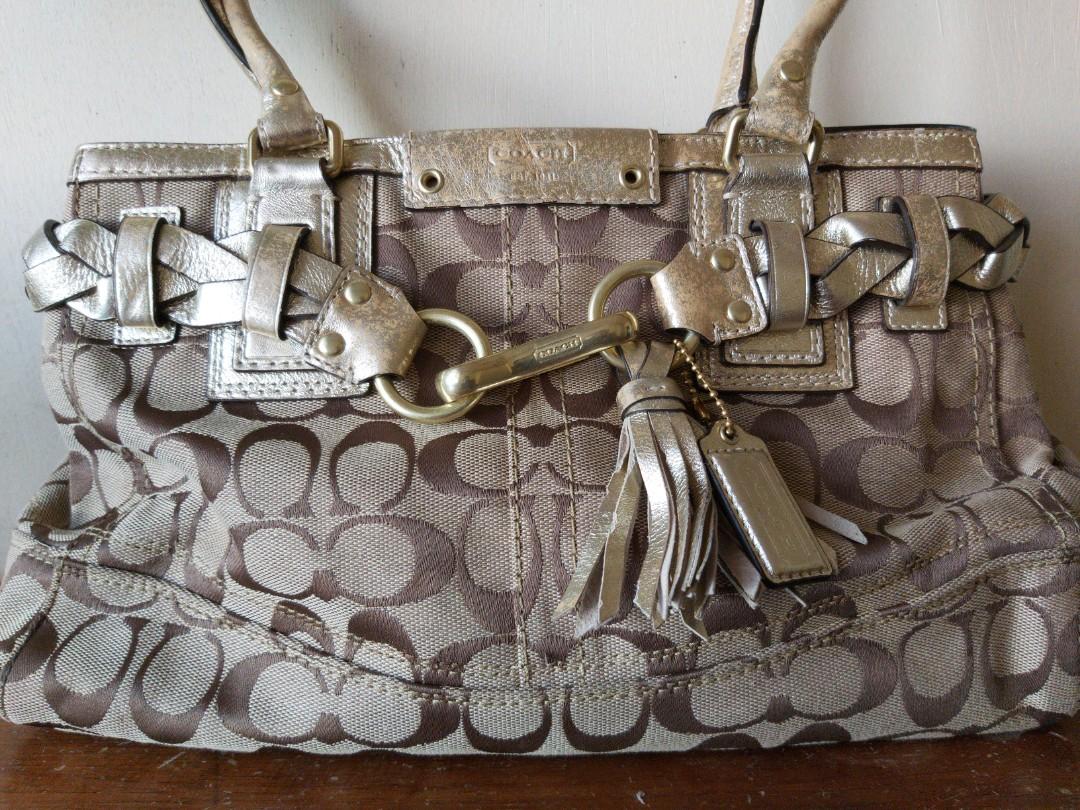 Coach Hampton Signature Logo Canvass Handbag (Category: Luxury Bags & Wallets) located in Iba. Submitted by skygregorio (Listing ID 1171663655, Image 2). Description: 100% Original 😊 All clean inside po.. Nastock lang po kaya may flaws.. Please see pictures po for reference. All good po ang Canvass material pero may oxidation/ fading part po sa mga metallic parts. Hopefully, magawan po ng paraan if nirepaint. Still negotiable. PM for more detail