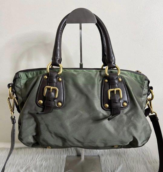 Prada 2-Way Bag (Category: Luxury Bags & Wallets) located in Manila. Submitted by heyqueeney (Listing ID 1171681263, Image 3). Description: Original Prada 2 Way Bag Can be shoulder bad or sling bag No tarnished hardwares With color transfer that looks like Ombre style .