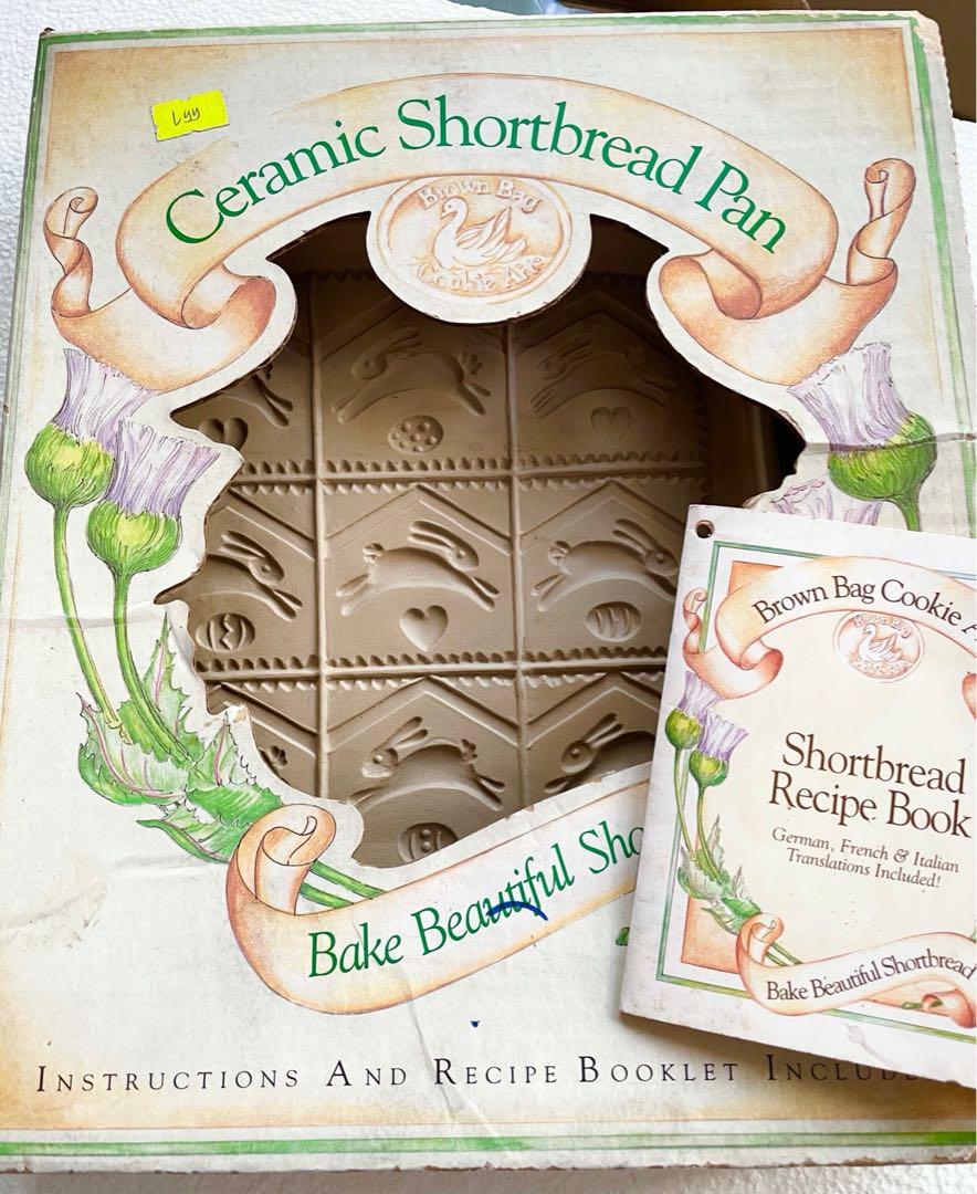 Shortbread Cookie Mold Pan (Category: Bakeware) located in Paranaque City. Submitted by paw_prints9 (Listing ID 1171813950, Image 2). Description: Vintage 1993 ceramic shortbread cookie pan Bunny and egg design 10.5 x 2 x 12 inches Not used, but stored many years Pan has no issues; in very good condition Includes a mini recipe book (some pages with insect holes) Box is intact but some discoloration .