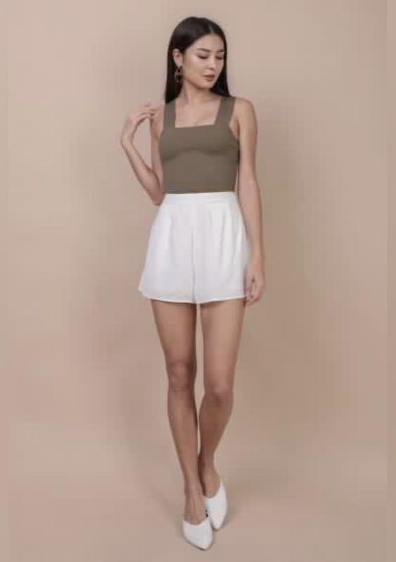 Luna Basic Top (Category: Sleeveless) located in Singapore. Submitted by littlemisssunshine. (Listing ID 1171646591, Image 2). Description: Washed but unworn Item is in excellent condition Refer to last page for measurements Available in Cedar and White No trades .