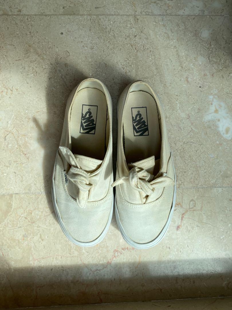 Vans bow slip on sale