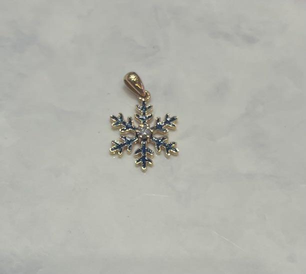 Gold snowflake charm on sale