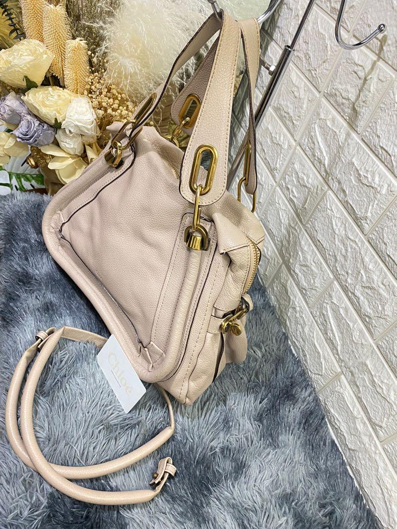 Chloe Paraty in Nude Beige (Category: Luxury Bags & Wallets) located in Quezon City. Submitted by christineboller (Listing ID 1172016923, Image 3). Description: Chloe Paraty Top Handle bag medium in Nude Beige. 8.5/10 condition, with minimal scratches as shown in photo. Clean interior; date code 04-11-50. Comes with Chloe authenticity card & strap for only P15K. .
