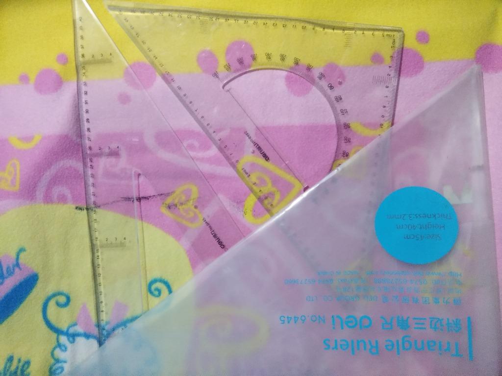 Deli Big Triangle Rulers (Category: Stationery & School Supplies) located in Tanza. Submitted by mhel_g (Listing ID 1171938658, Image 2). Description: - 30 x 60 x 90 triangle - 90 x 45 x45 triangle - Size: 45 cm - Height: 40 cm - Thickness: 3.2 mm - Unused but due to long time storage between books, there are scratches on the surface but numbers are still clear & visible ***Will accommodate buyers from South Metro Manila & Cavite only.