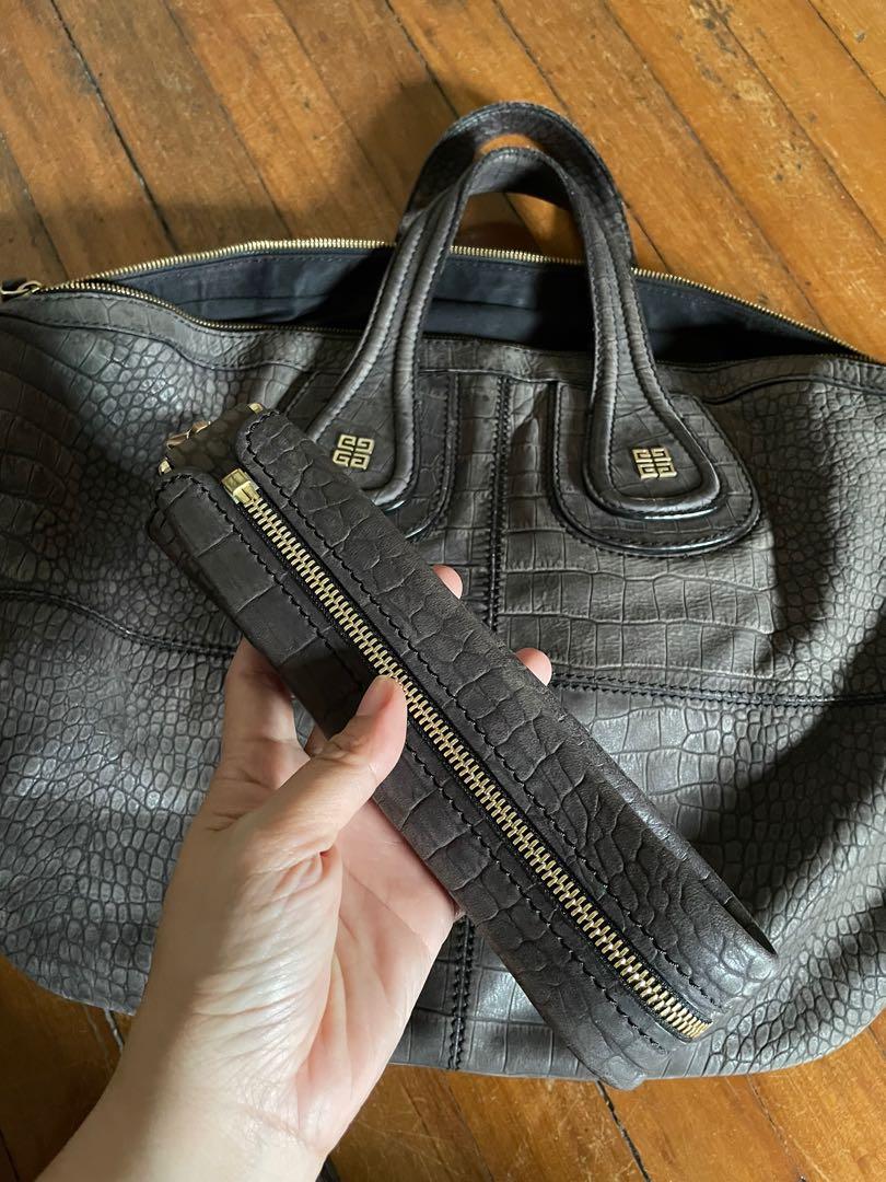 Givenchy nightingale medium (Category: Luxury Bags & Wallets) located in Makati City. Submitted by myterry1941 (Listing ID 1171891235, Image 2). Description: Medium size With short strap Brushed gold hardware Kindly see up close photo to see leather description With customised bag puff included .