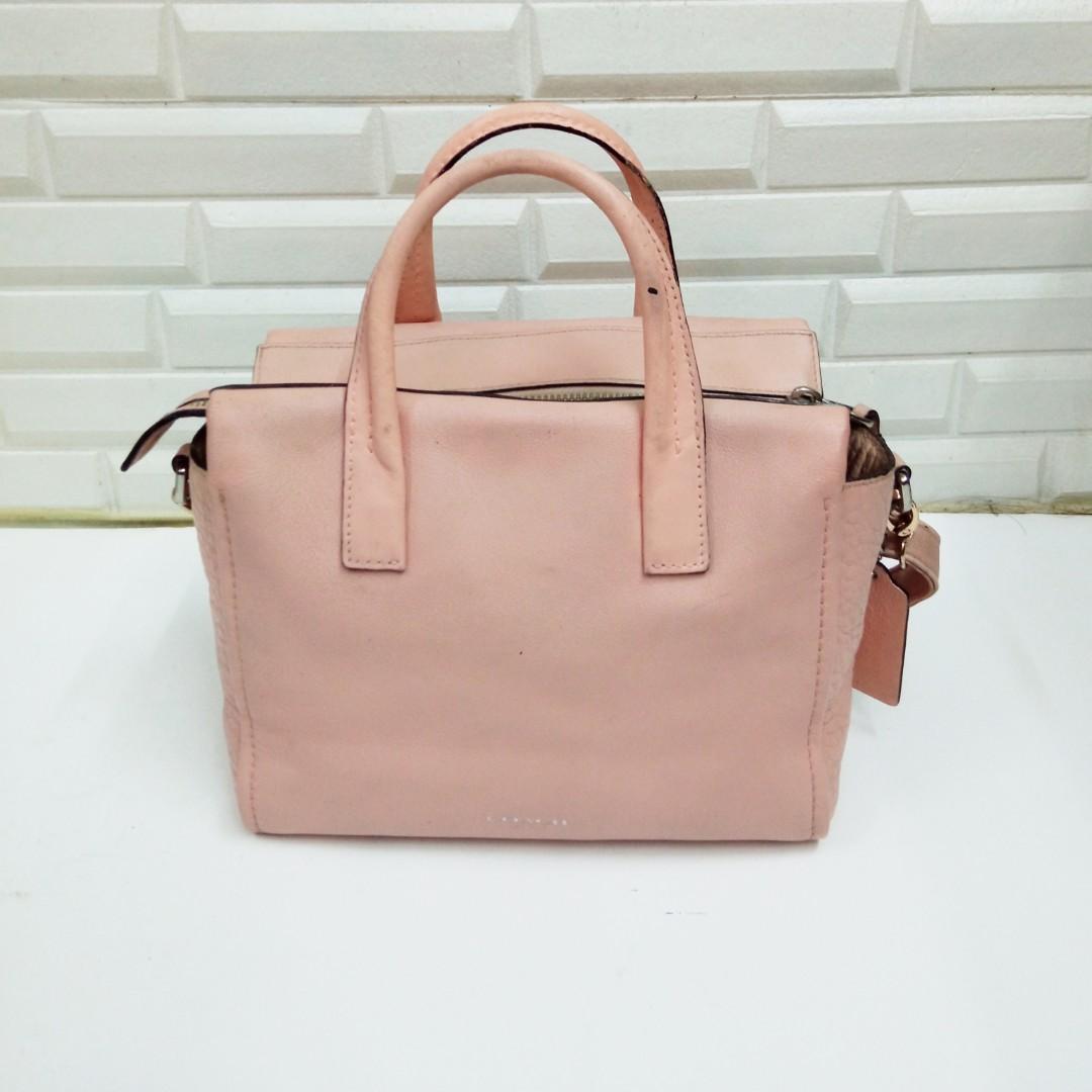 Peach coach purse top