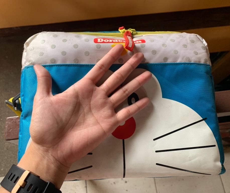 Doraemon Baby Bag (Category: Other Babies Going Out Needs) located in Marikina City. Submitted by shek_out (Listing ID 1172053976, Image 2). Description: Selling preloved baby bag Sling bag (adjustable strap) Seldom used Collectors item Issue: Needs cleaning .