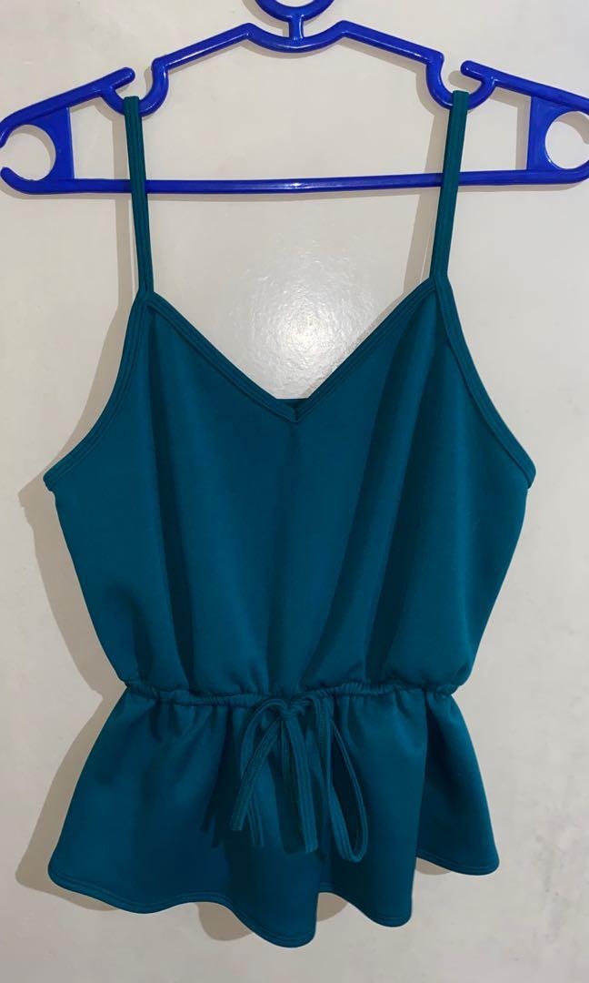 Emerald Green VNeck Peplum Top (Category: Sleeveless) located in Quezon City. Submitted by rs.declutters (Listing ID 1172112451, Image 1). Description: Excellent quality & very flattering! 😍 Used once only. No when worn pics. RFS: decluttering *No return, no exchange* *Be a responsible buyer* *For more inquiries on the product, kindly dm seller*.