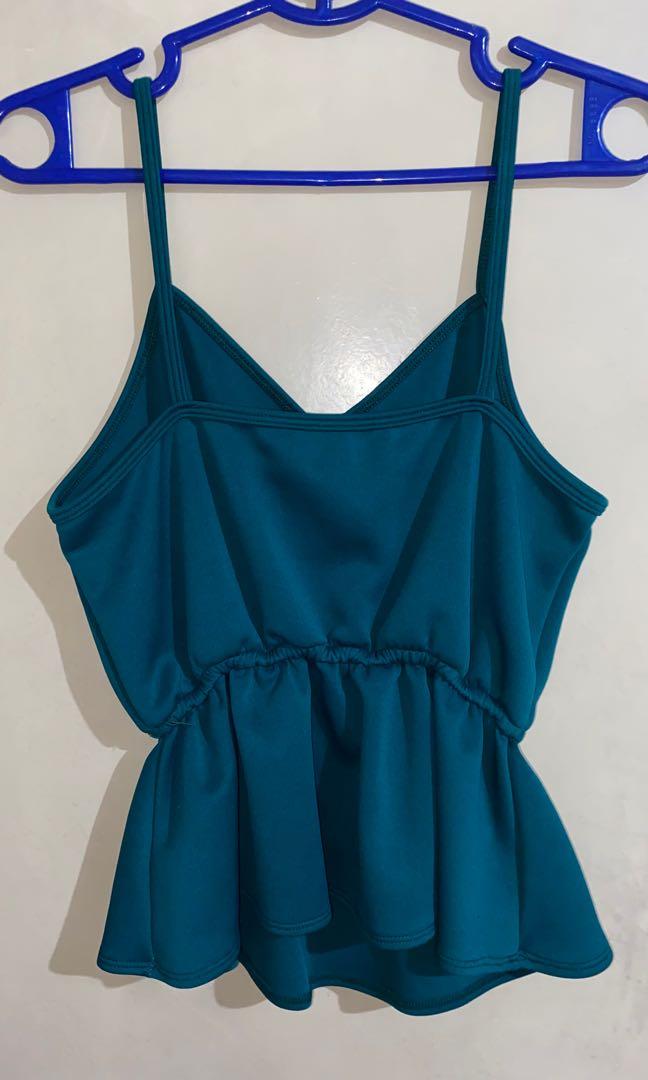 Emerald Green VNeck Peplum Top (Category: Sleeveless) located in Quezon City. Submitted by rs.declutters (Listing ID 1172112451, Image 2). Description: Excellent quality & very flattering! 😍 Used once only. No when worn pics. RFS: decluttering *No return, no exchange* *Be a responsible buyer* *For more inquiries on the product, kindly dm seller*.