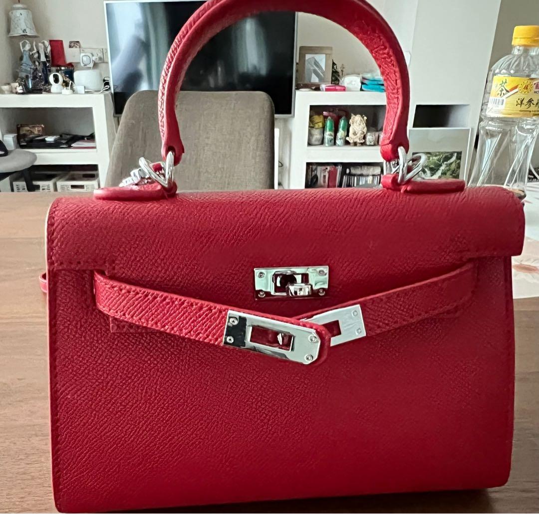 Red crossbody bag with silver hardware