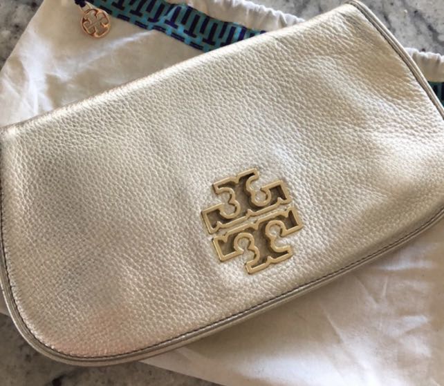 Tory burch gold clutch with strap, Luxury, Bags & Wallets on Carousell