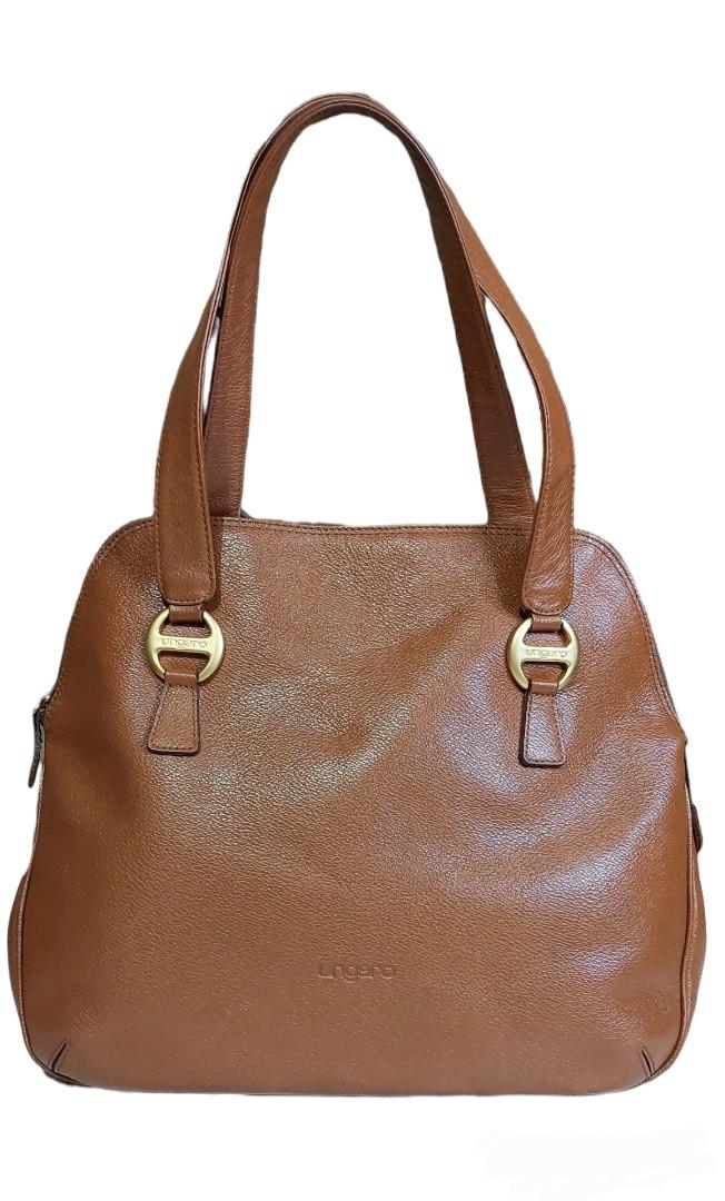 Ungaro alma bag (Category: Shoulder Bags) located in Davao. Submitted by wengbagstuff (Listing ID 1172174202, Image 1). Description: 🍀 vintage piece 🍀 genuine leather 🍀 w/ signs of usage (inner lining only) 🍀 no damage on pipings or cracks on leather.