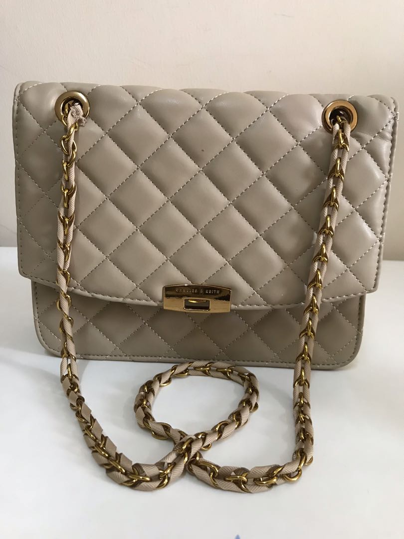 Quilted push lock bag online