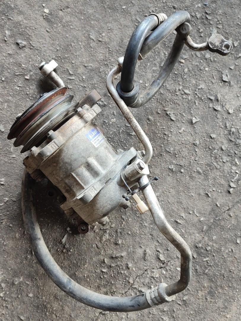 COMPRESSOR AIRCOND WIRA 1.31.5, Auto Accessories on Carousell