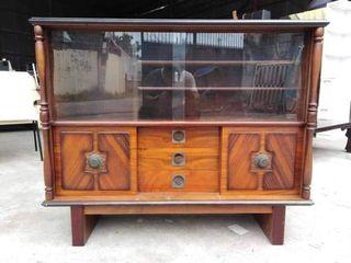 Console Cabinet
L44 W15 H36 inches 
olid wood
sliding glass doors
in good condition