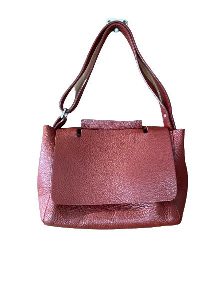 Genuine Italian Leather Red Purse (Category: Shoulder Bags) located in Muntinlupa City. Submitted by sabmi (Listing ID 1172269487, Image 1). Description: Made in Italy, really soft, supple leather. Outside is in great condition, used regularly for a few months two years ago then carefully stored and taken care off. Bottom is firm and holds its shape, strap is adjustable, and can be worn long or on the shoulder. Has inner pocket with zipper. Has a
