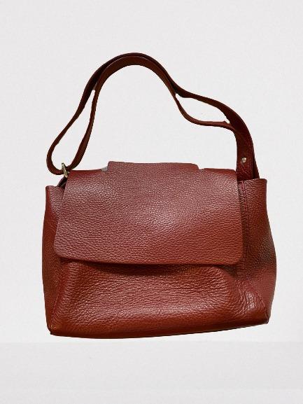 Genuine Italian Leather Red Purse (Category: Shoulder Bags) located in Muntinlupa City. Submitted by sabmi (Listing ID 1172269487, Image 2). Description: Made in Italy, really soft, supple leather. Outside is in great condition, used regularly for a few months two years ago then carefully stored and taken care off. Bottom is firm and holds its shape, strap is adjustable, and can be worn long or on the shoulder. Has inner pocket with zipper. Has a