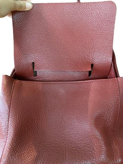 Genuine Italian Leather Red Purse (Category: Shoulder Bags) located in Muntinlupa City. Submitted by sabmi (Listing ID 1172269487, Image 3). Description: Made in Italy, really soft, supple leather. Outside is in great condition, used regularly for a few months two years ago then carefully stored and taken care off. Bottom is firm and holds its shape, strap is adjustable, and can be worn long or on the shoulder. Has inner pocket with zipper. Has a