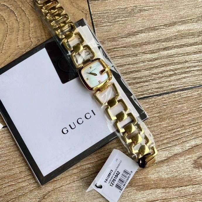 Gucci moth watch top