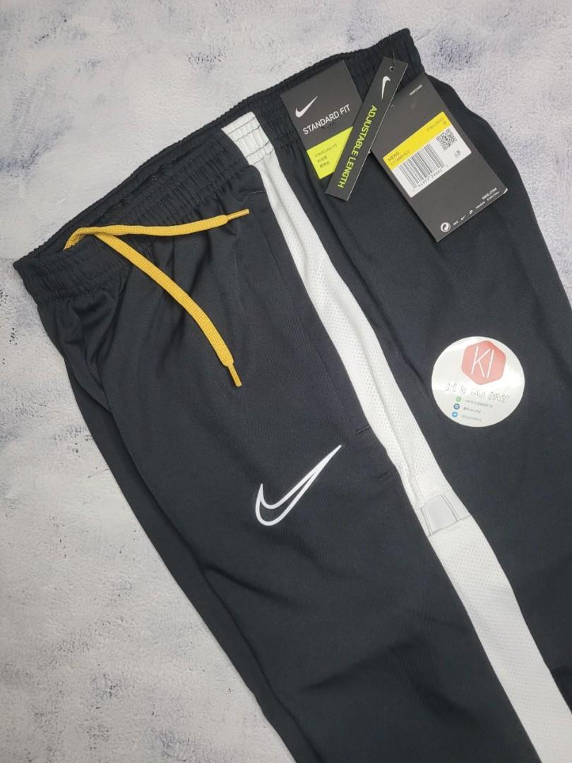 Nike track cheap pants sizing