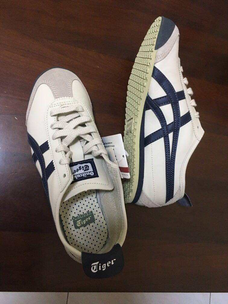 Onitsuka Tiger Sneakers (now-21Aug) (Category: Sneakers) located in Singapore. Submitted by stan48 (Listing ID 1172347205, Image 1). Description: Mexico 66 Leather Material Birch/India Ink/Latte US women 6.5/Euro 37.5/UK4/US unisex 5 It is not slip-on. Comes with shoe lace. Made in Indonesia .