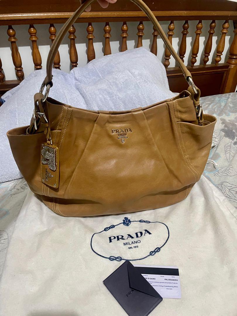 PRADA brown leather hobo bag, Luxury, Bags & Wallets on Carousell