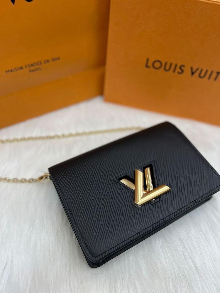 $2200 wire. Lightly Used Louis Vuitton Owl Twist Chain Wallet