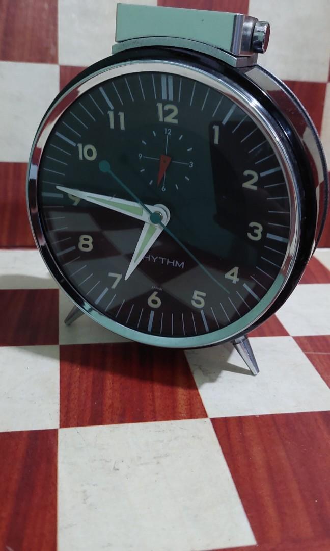 Alarm clock ( RHYTHM ) (Category: Clocks) located in Caloocan City. Submitted by thegreat. (Listing ID 1172516030, Image 3). Description: good running condition black display dial convex glass made in japan mechanical hand wind.