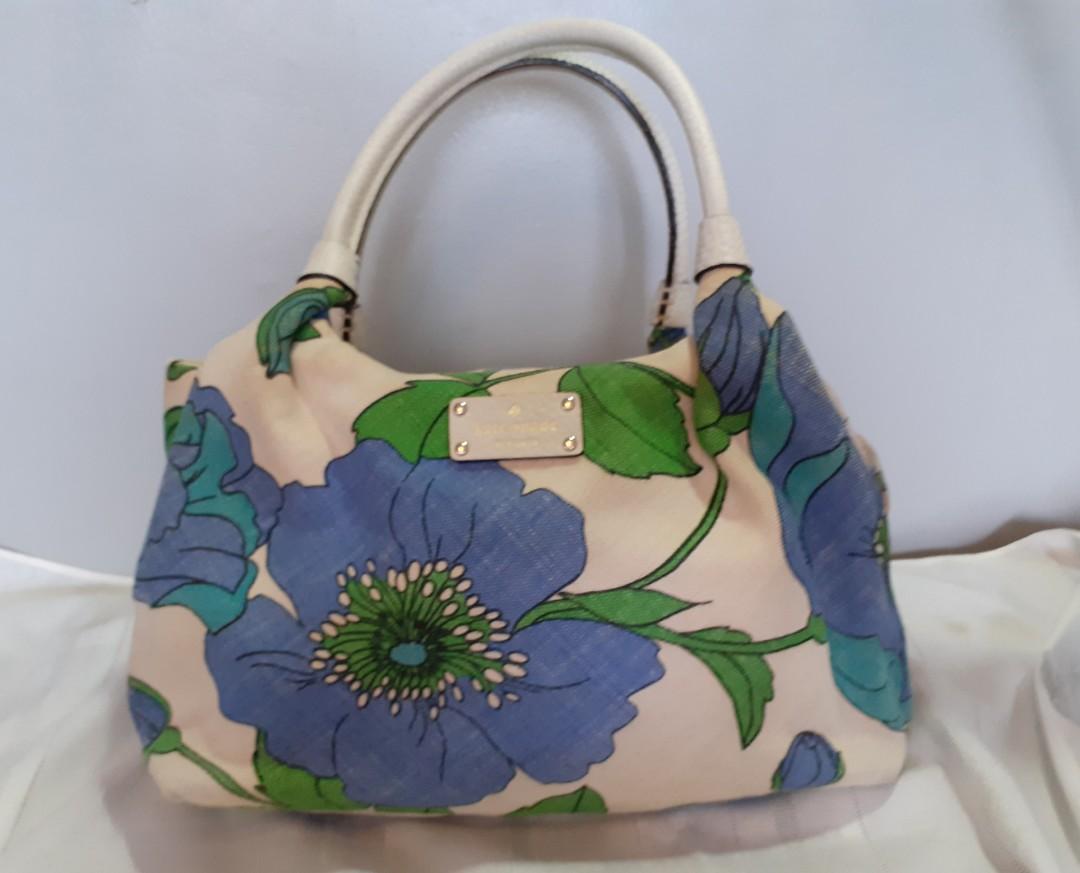 Kate Spade Floral Handbag (Category: Luxury Bags & Wallets) located in Mandaluyong City. Submitted by vicoyb (Listing ID 1172524814, Image 1). Description: Brand: Kate Spade Dimension: 13 x 6 x 9" (L x W x H) This is a used item so please manage expectations. What you see is what you get. "As is." Color may vary to lighting and effects..