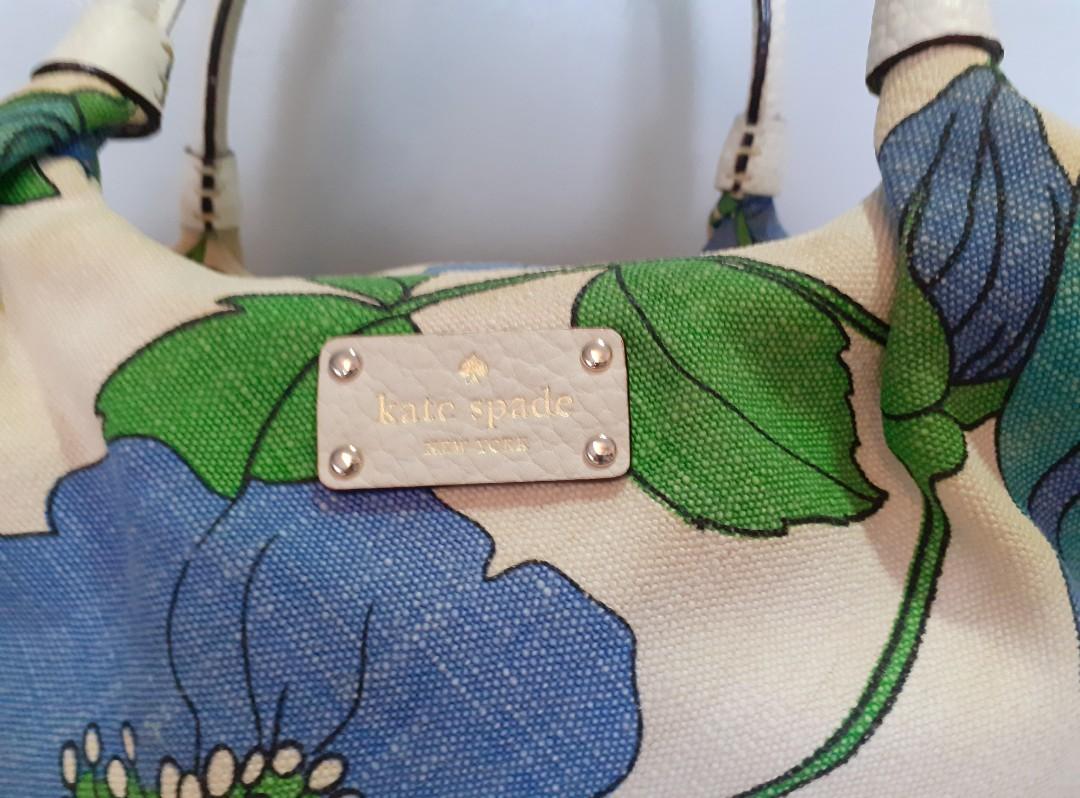 Kate Spade Floral Handbag (Category: Luxury Bags & Wallets) located in Mandaluyong City. Submitted by vicoyb (Listing ID 1172524814, Image 3). Description: Brand: Kate Spade Dimension: 13 x 6 x 9" (L x W x H) This is a used item so please manage expectations. What you see is what you get. "As is." Color may vary to lighting and effects..