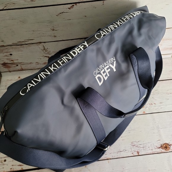 Calvin klein defy duffle bag brand new in plastic bag Sports