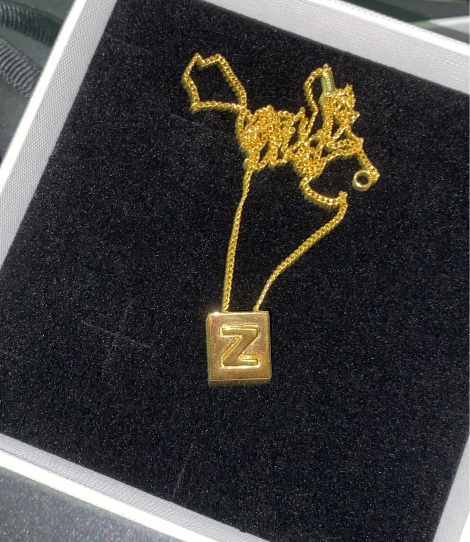 celine alphabet necklace Luxury Accessories on Carousell