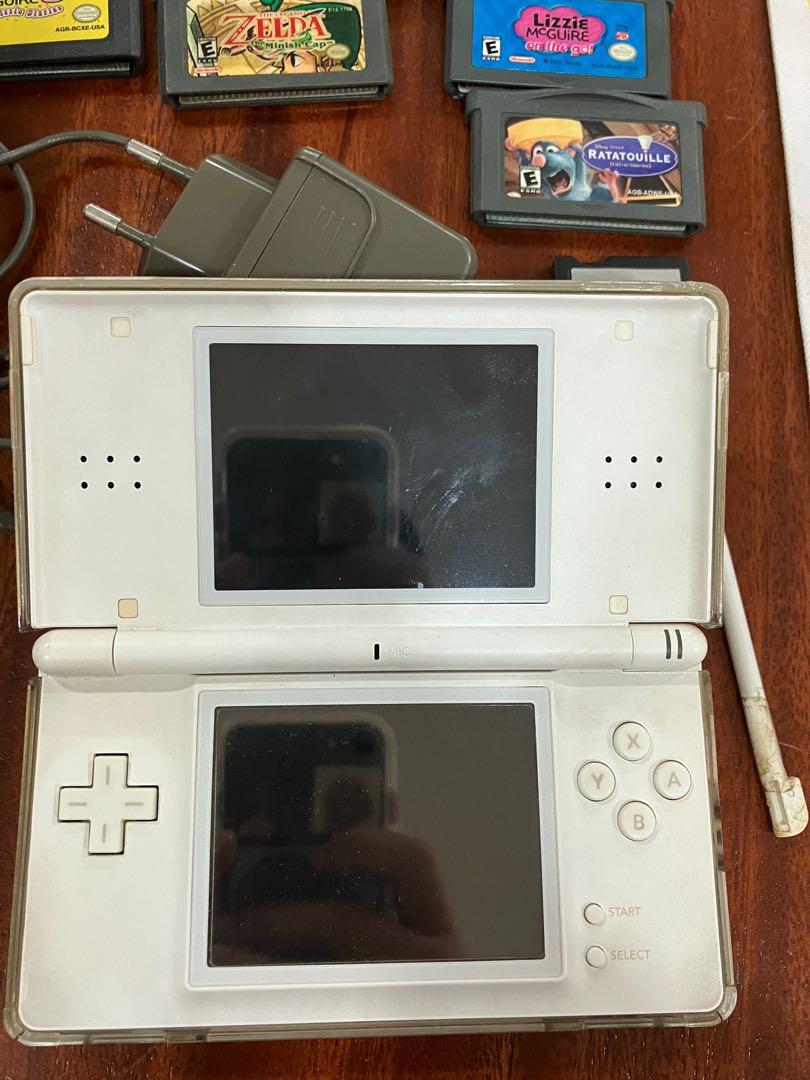 Nintendo DS lite (Category: Nintendo) located in Quezon City. Submitted by giagcuc (Listing ID 1172889737, Image 3). Description: -price includes all games and accessories in the picture -working and charging -only issue is touch screen is blurred around the edges.