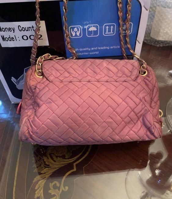 Prada Tessuto Saffiano Nylon Bag (Category: Luxury Bags & Wallets) located in Manila. Submitted by poeticallyinfamous (Listing ID 1172916004, Image 3). Description: Prada Tessuto Saffiano Pink Quilted Nylon Chain Shoulder Bag BR4965 💯Authentic Bag only Brand: Prada, BR4965, zip closure, interior zip pocket Material: Tessuto(Nylon) + Saffiano (Leather) Dimensions: 11”x5.5”x7”, Silver hardware .