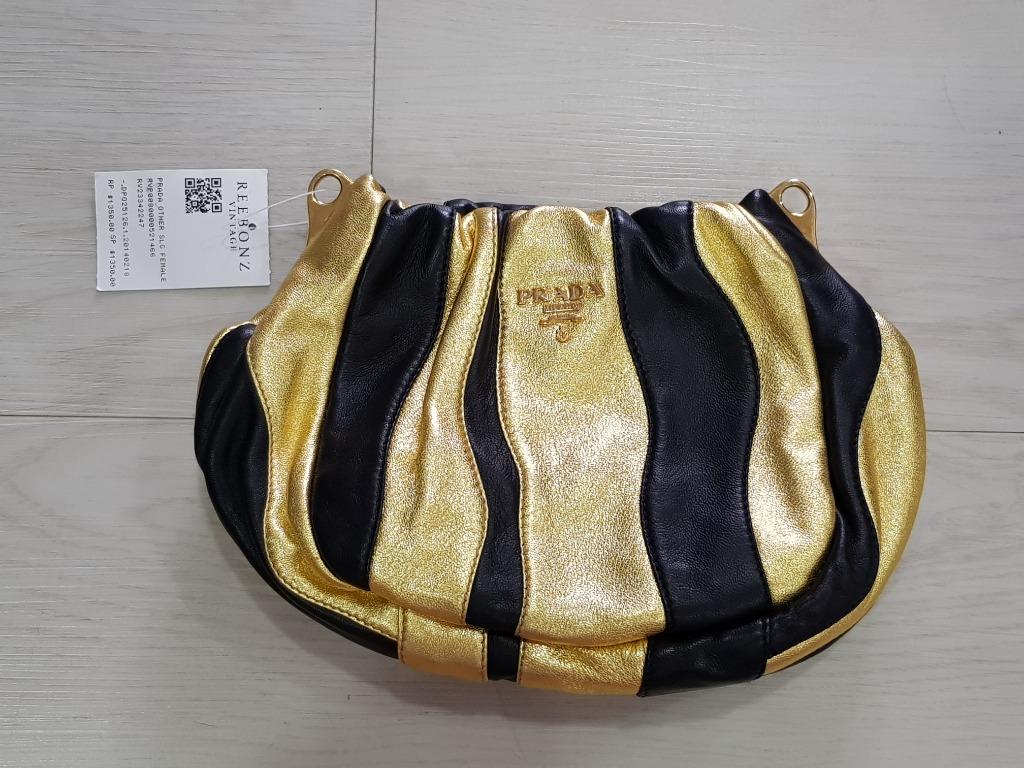 Gold prada bag sales