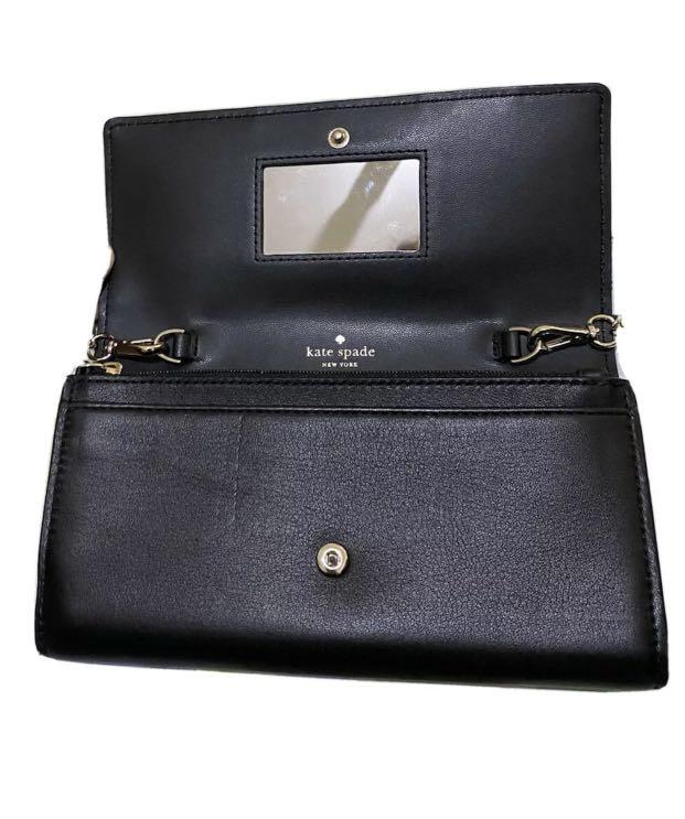 Preloved Kate Spade Briar Wallet on Chain (Category: Luxury Bags & Wallets) located in Pasig City. Submitted by getstuffph (Listing ID 1172801741, Image 2). Description: Can pass as new with dust bag.
