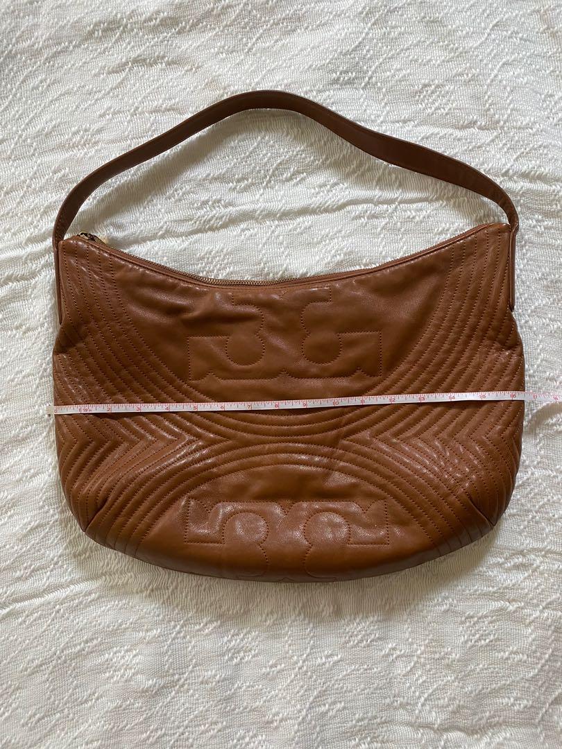 Preloved Tory Burch Leather Hobo Bag (Category: Luxury Bags & Wallets) located in Pasig City. Submitted by getstuffph (Listing ID 1172802698, Image 3). Description: With dust bag. Retail bag. .