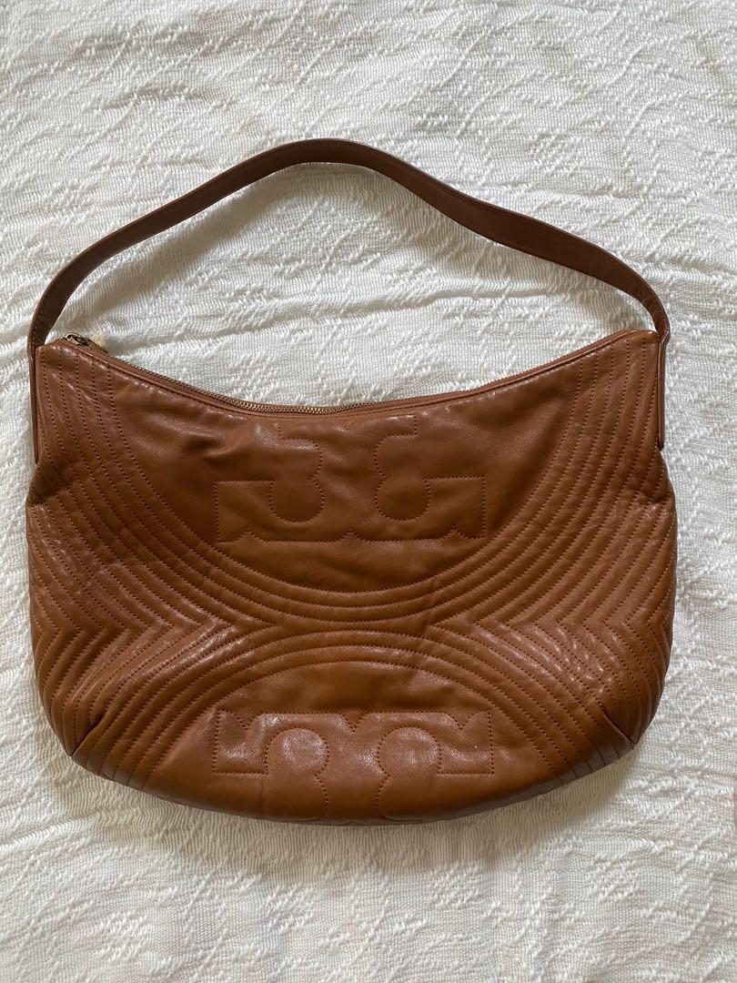 Preloved Tory Burch Leather Hobo Bag (Category: Luxury Bags & Wallets) located in Pasig City. Submitted by getstuffph (Listing ID 1172802698, Image 1). Description: With dust bag. Retail bag. .
