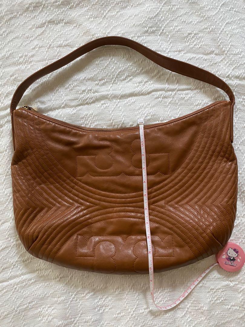 Preloved Tory Burch Leather Hobo Bag (Category: Luxury Bags & Wallets) located in Pasig City. Submitted by getstuffph (Listing ID 1172802698, Image 2). Description: With dust bag. Retail bag. .
